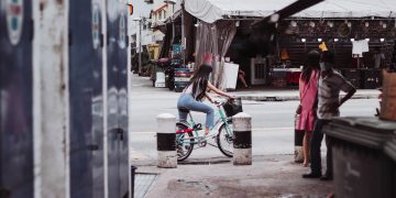 women, bicycle, street