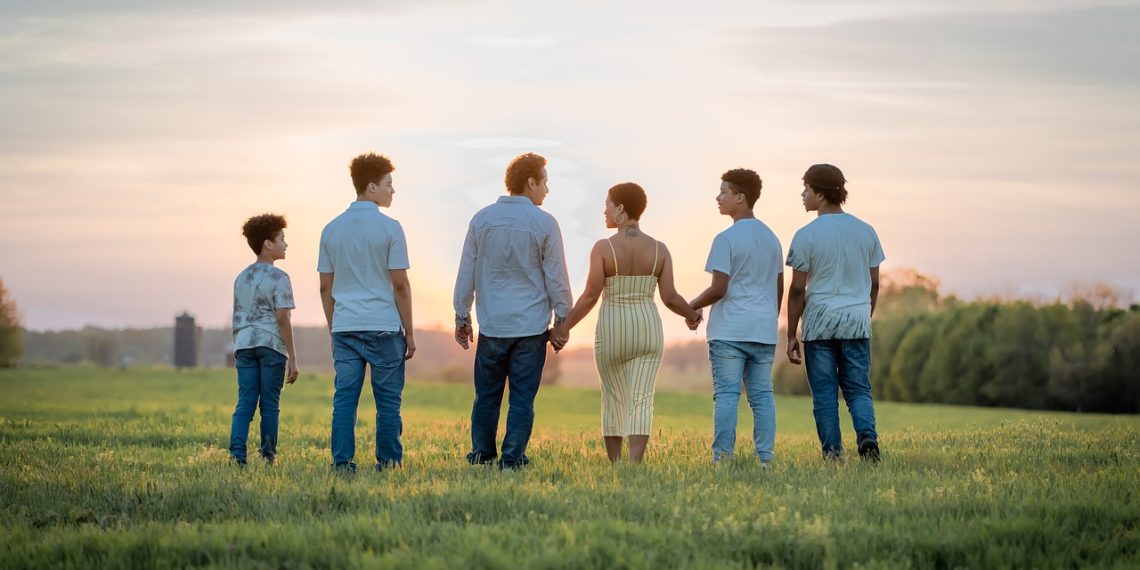 family, sunset, field